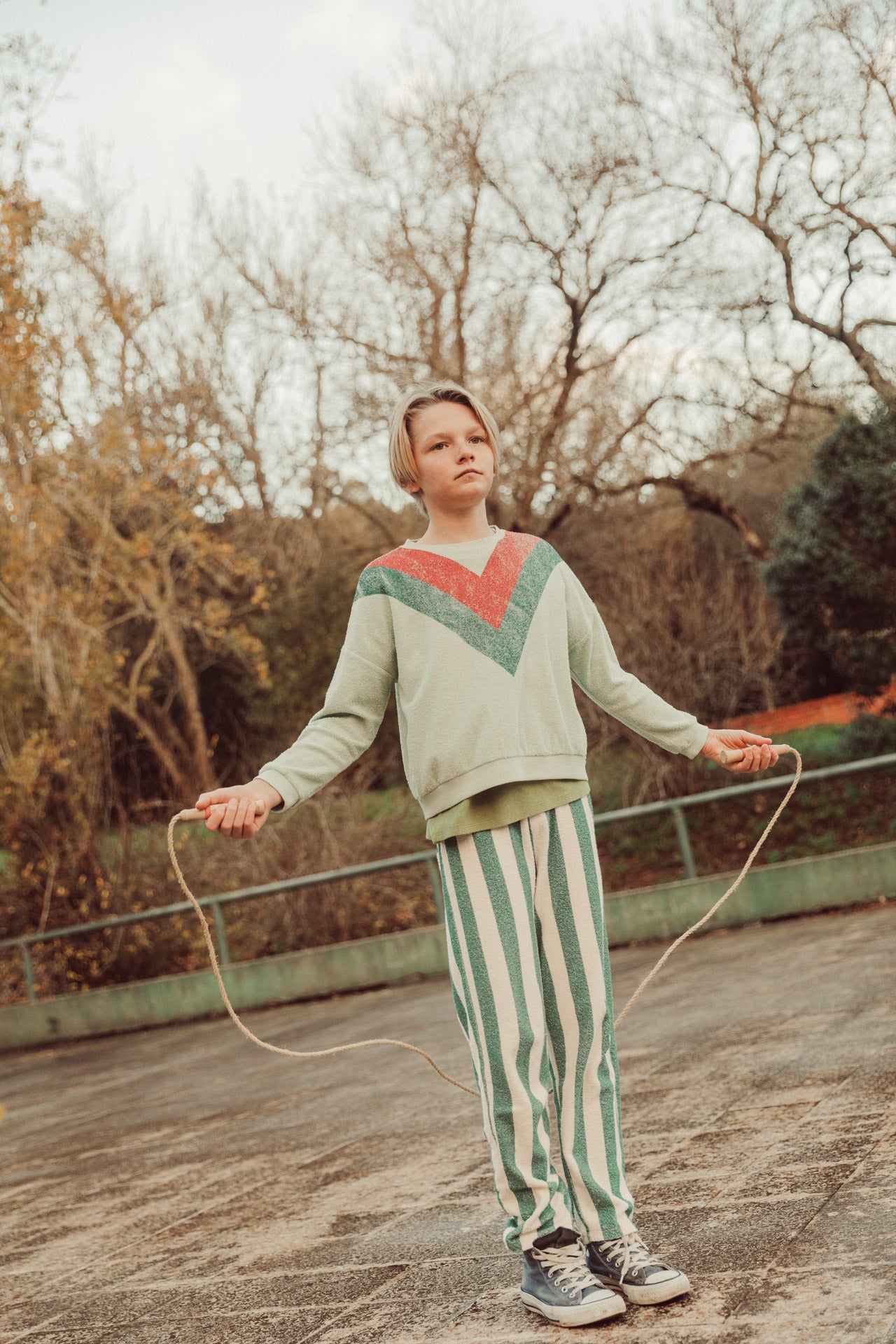 Sweatshirt – mint green w/ multicolor triangle print